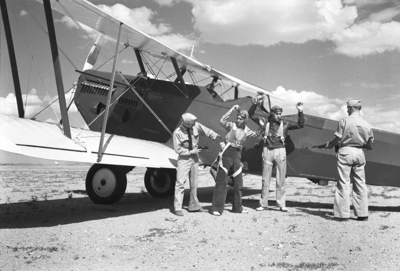 Army aviators pretend to be aerial drug smugglers in the late 1930s during a Coast Guard exercise.