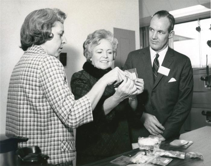 Rita Rapp explains a rehydratable food package to visitors. 