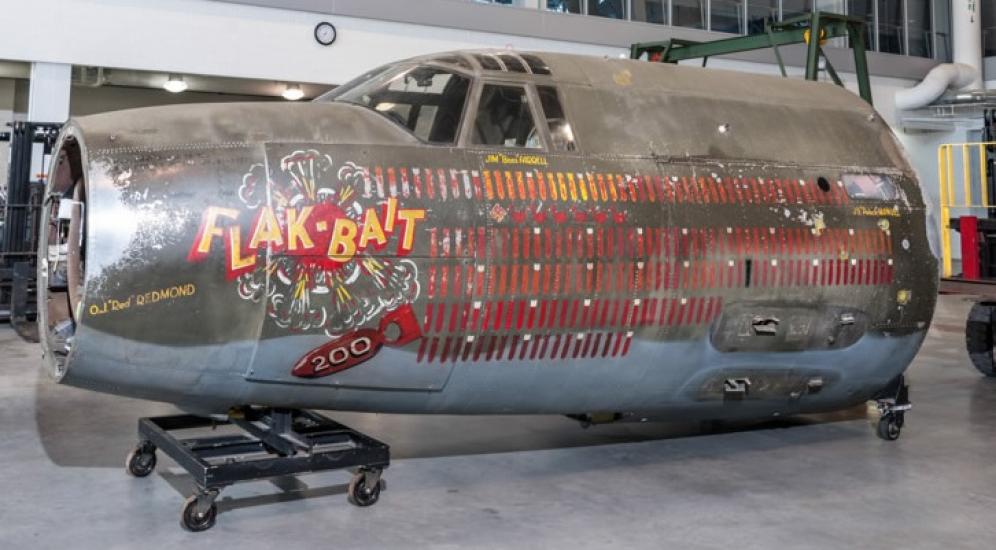 Flak-Bait’s forward fuselage, shown here in the National Air and Space Museum’s Mary Baker Engen Restoration Hangar, provides a graphic record of its WWII service.