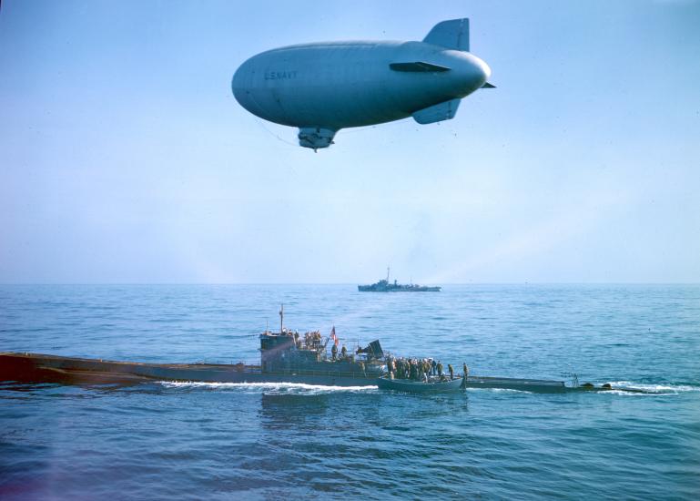 K-ship flies over surfaced U-Boat