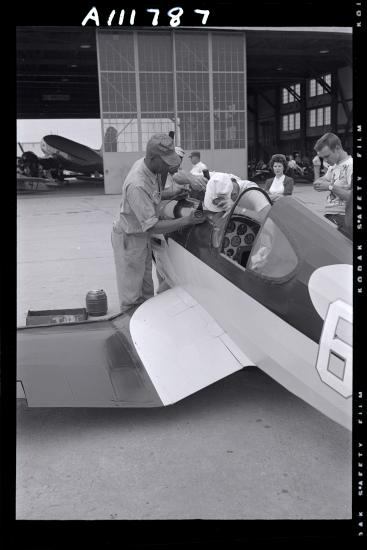 man works on aircraft