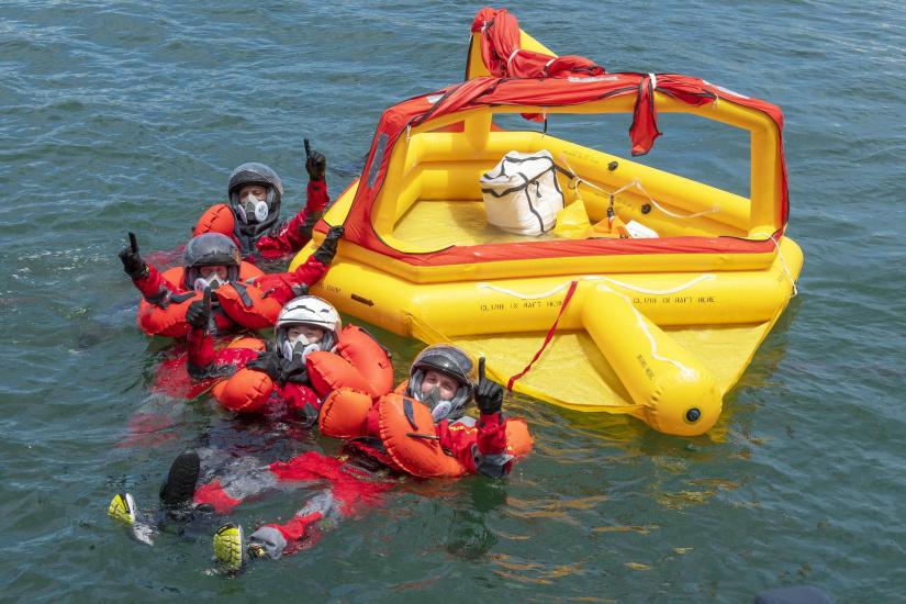 From back to front, pilot Victor Glover, mission specialist Shannon Walker, mission specialist Soichi Noguchi, and spacecraft commander Michael Hopkins participate in an egress training exercise on July 21, 2020.