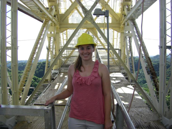 Jennifer Whitten in front of the telescope