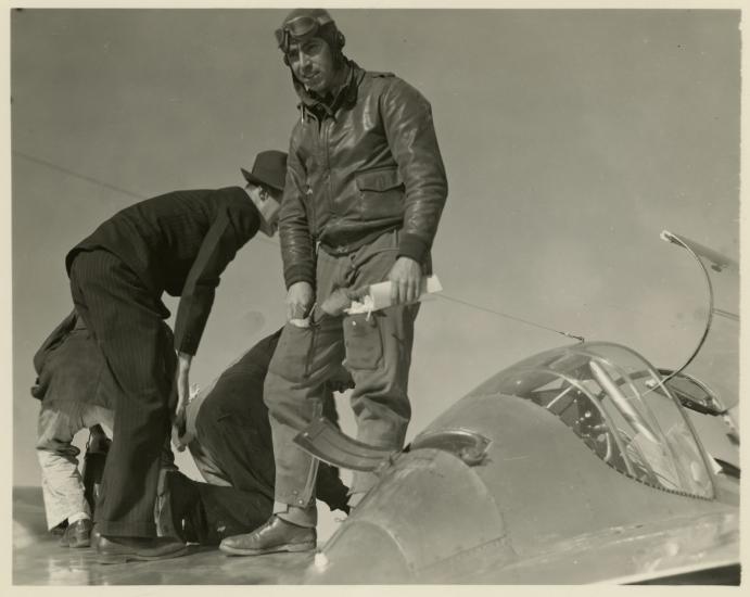 man climbing out of Lightning cockpit