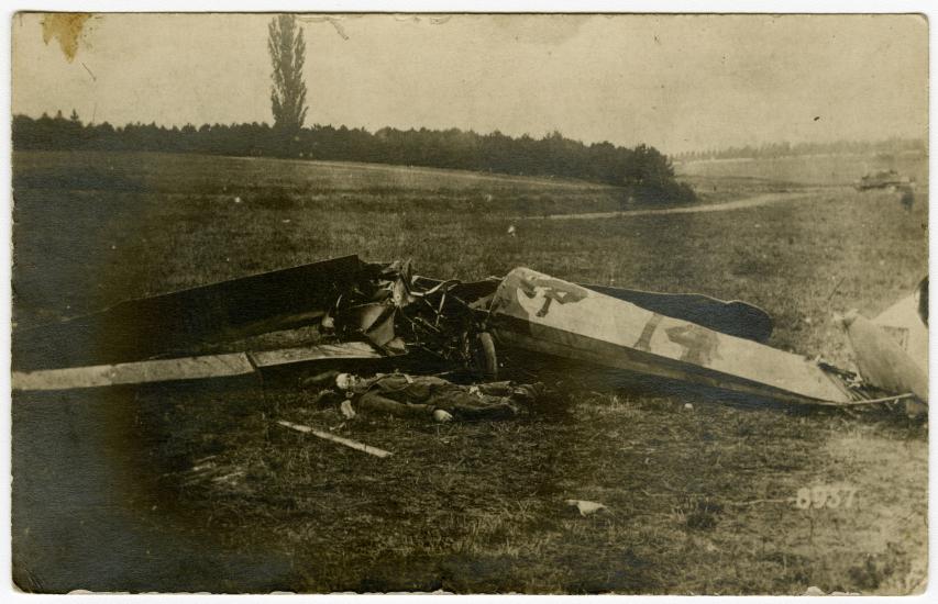 The body of Quentin Roosevelt beside his crashed aircraft.