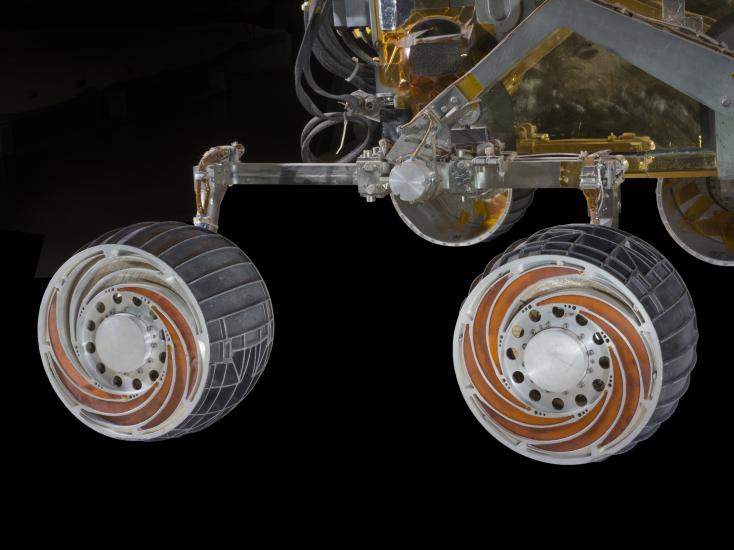 The MER SSTB wheels and chassis comprise a variation of the rocker-bogie mobility system.