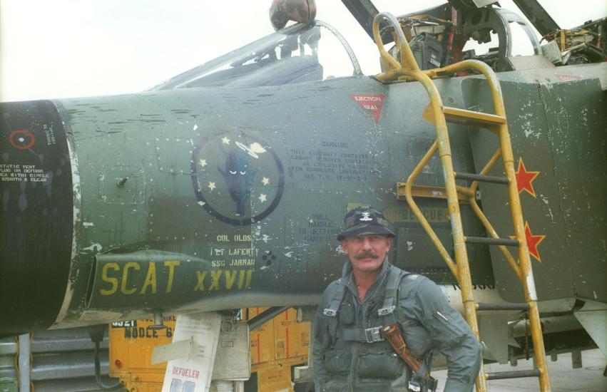 man in front of aircraft