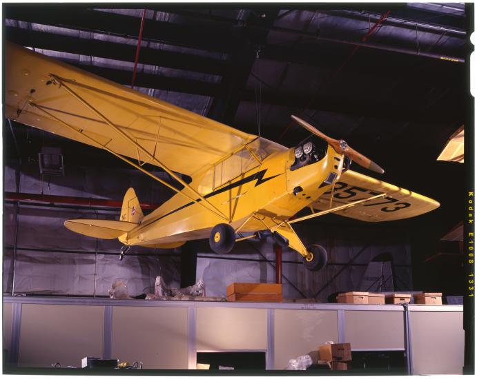 Yellow aircraft hanging