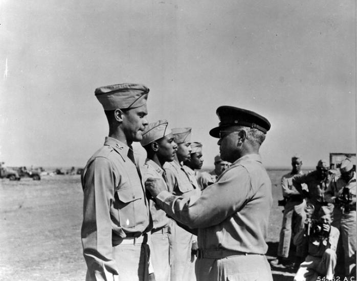 Benjamin O. Davis Sr. pins Distinguished Flying Cross on Davis Jr.