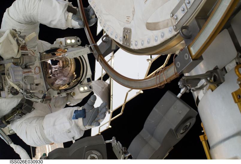 NASA astronaut Alvin Drew, STS-133 mission specialist, participates in an EVA. 