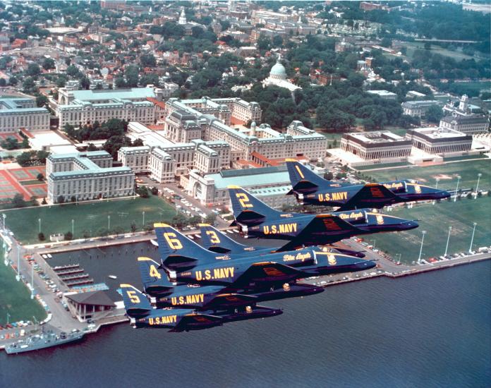 Blue Angles flying in formation over the training aircraft carrier