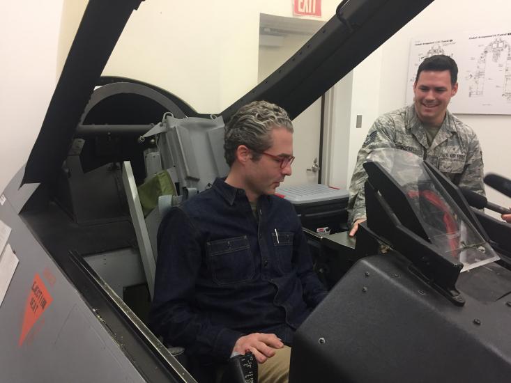 AirSpace host Nick Patridge sitting in F-16 ejection trainer